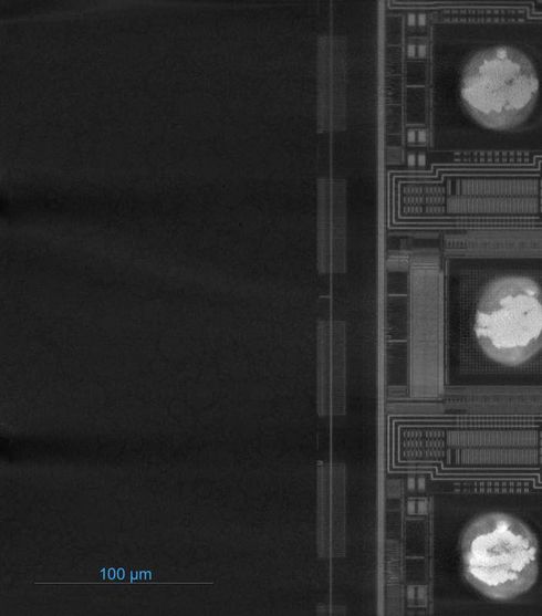 X-ray cross-sectional view of advanced packaging structures with 100 µm scale bar