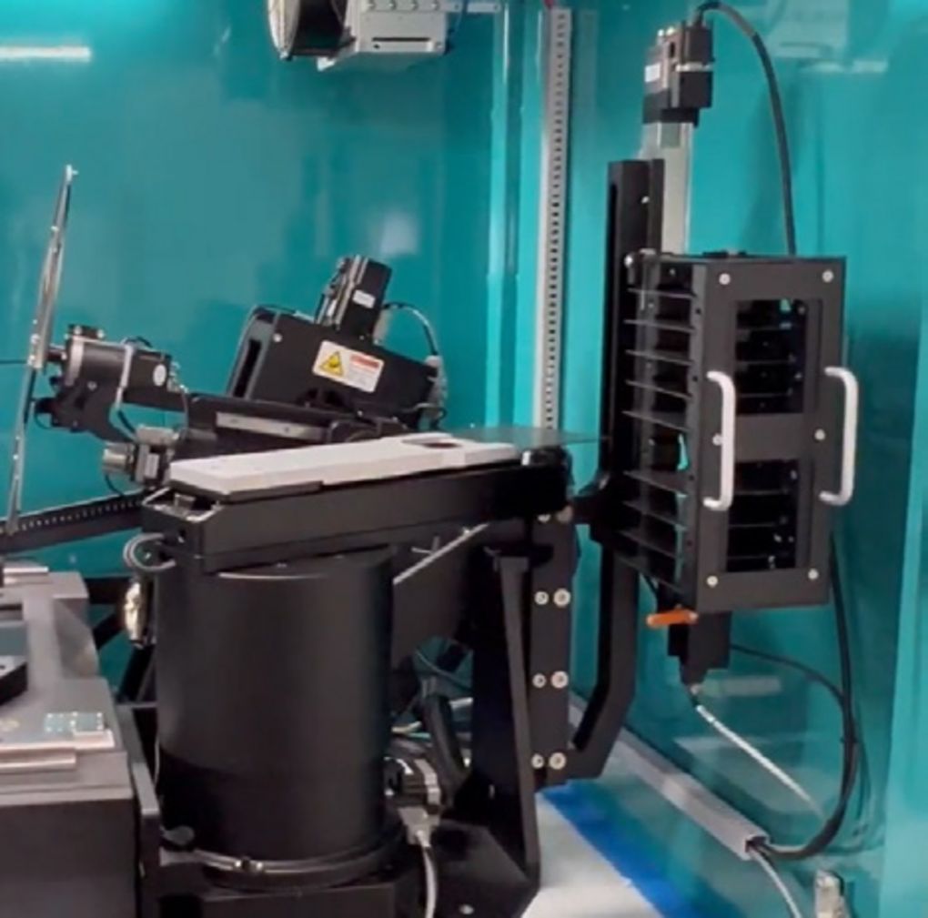 In-system sample robot with multi-slot cassette for unattended operation